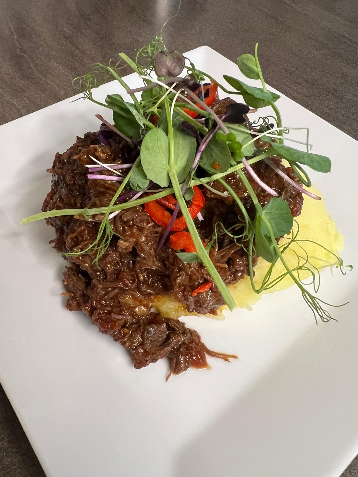 Beef cheek ragu in bone broth and red wine